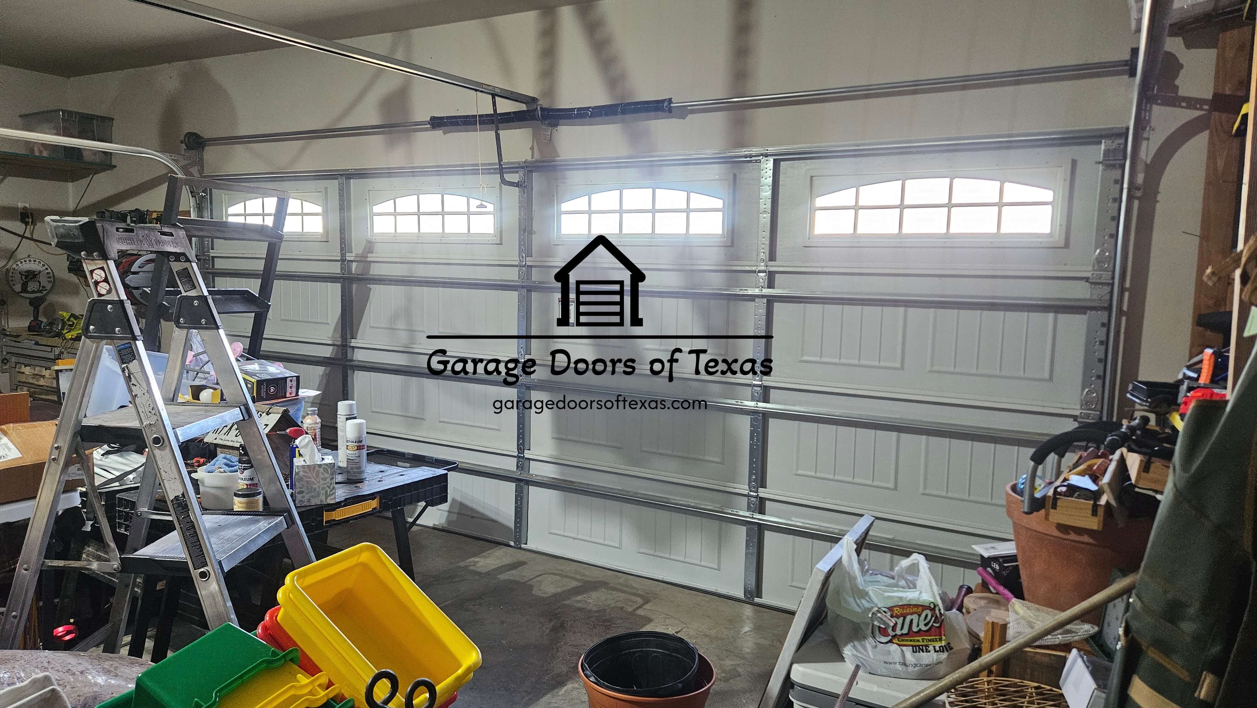 garagedoorsoftexas.com_garage_door_opener_repair